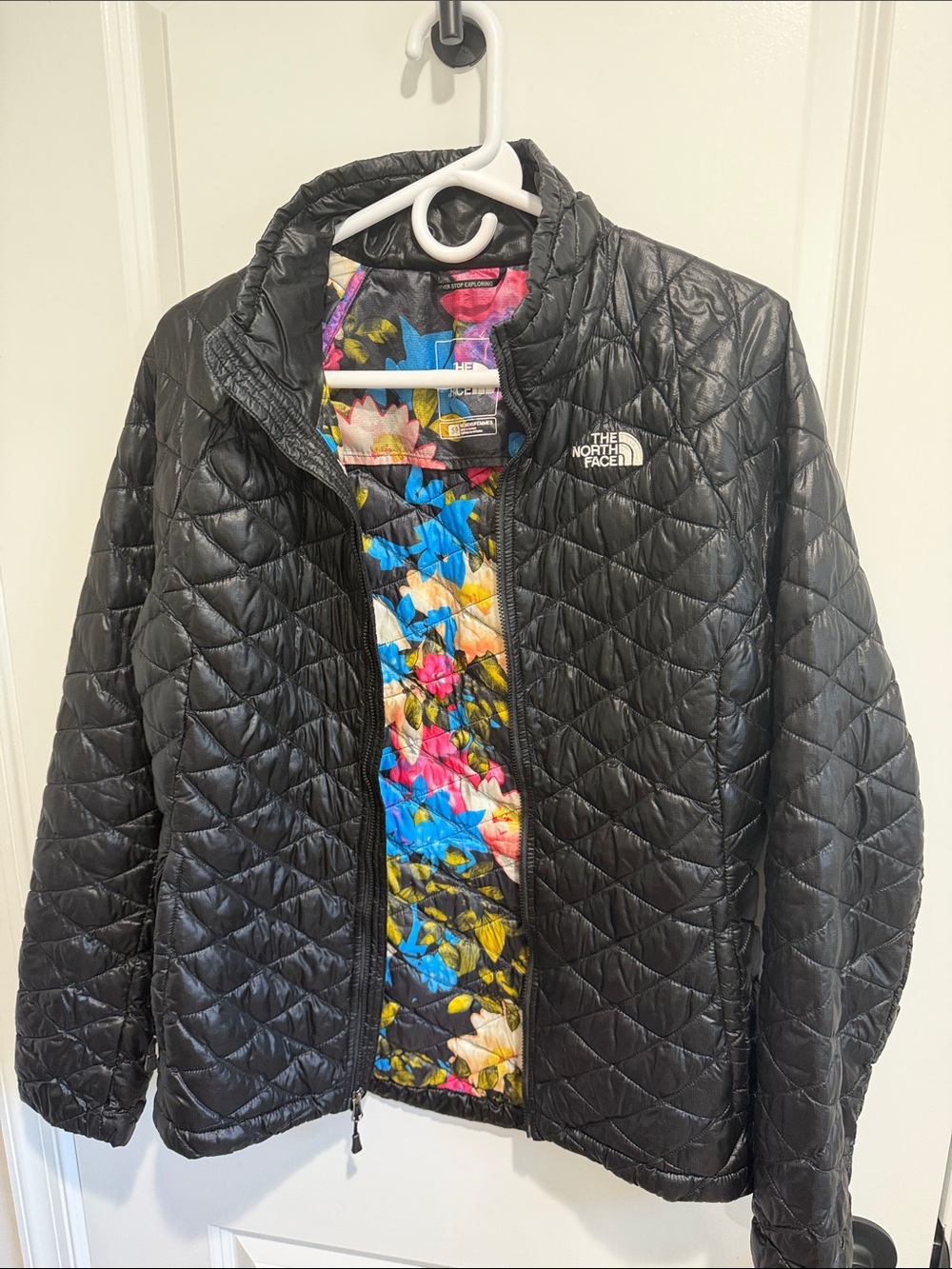 The North Face Black Thermoball Puffer Jacket with Floral Lining